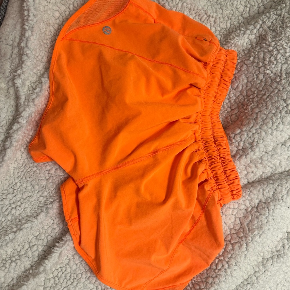 lululemon Hotty Hot Low-Rise Lined Short 4" size 2 (highlight orange)